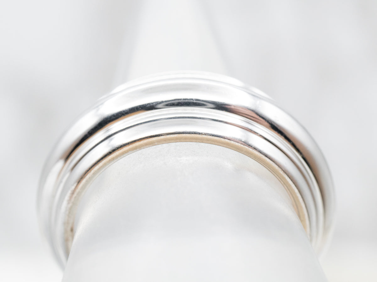 Bold 18-Karat Gold Piaget Spinner Band