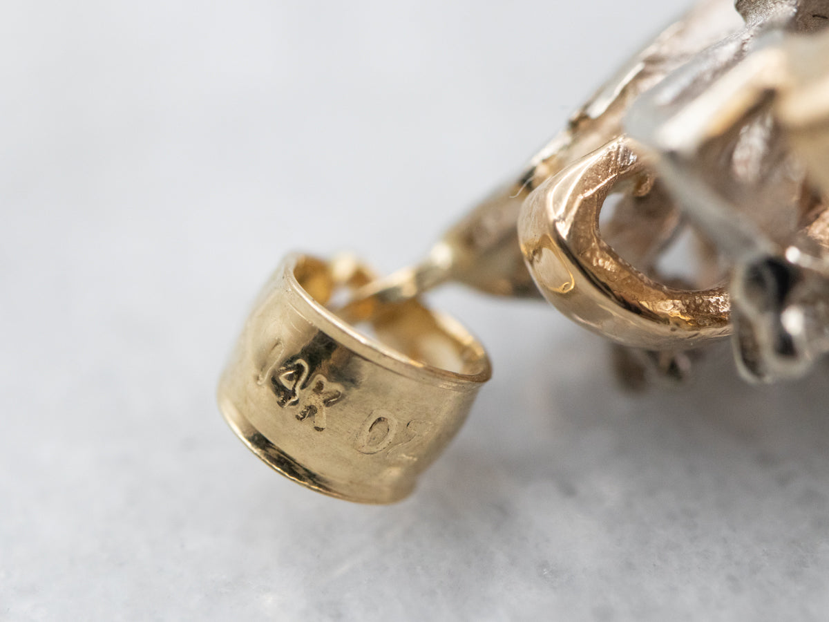 Swirling Diamond and Two Tone Gold Pendant