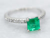 Stunning Emerald and Diamond Modern Engagement Ring