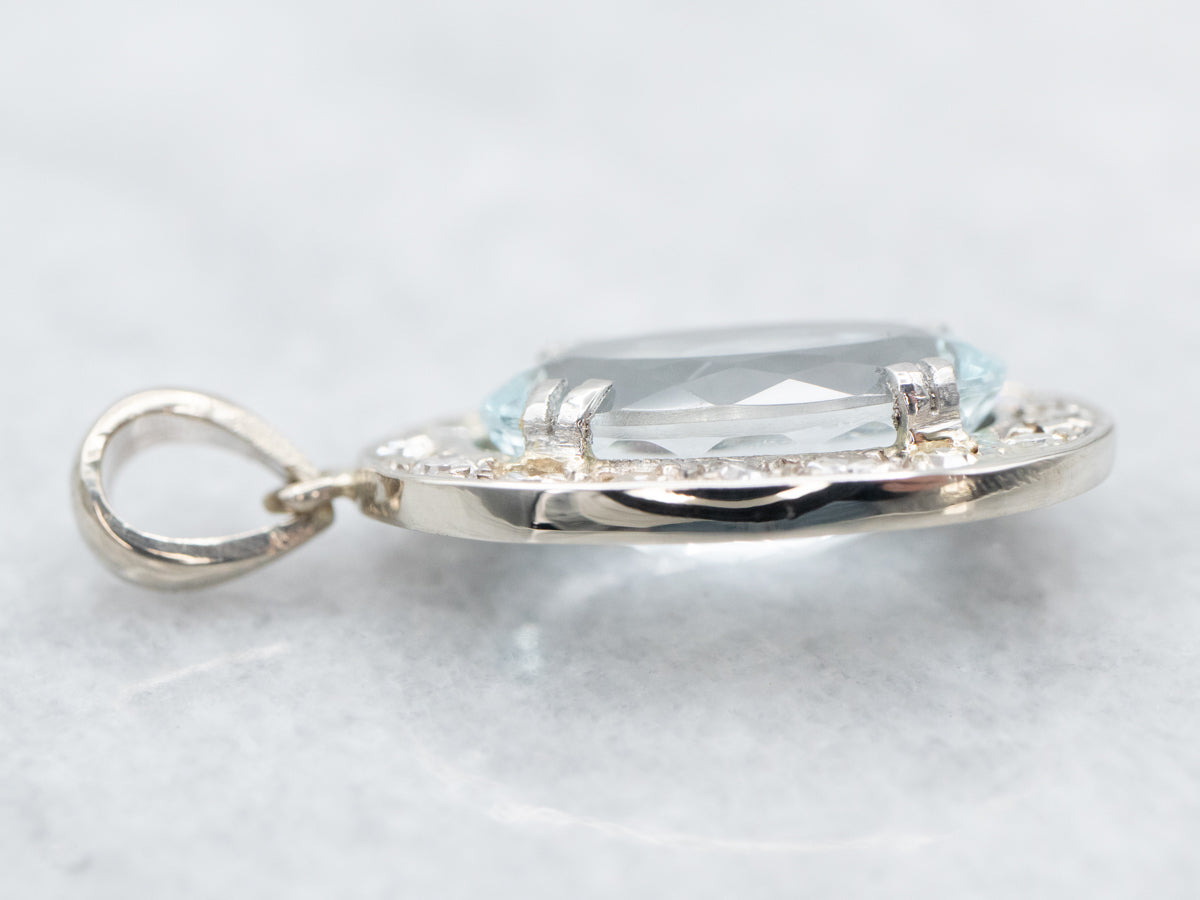 Alluring Blue Topaz and Diamond Halo Pendant