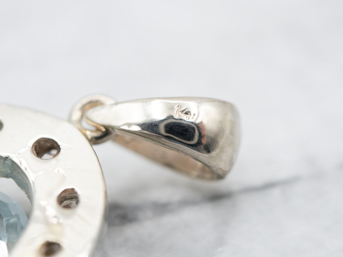 Alluring Blue Topaz and Diamond Halo Pendant