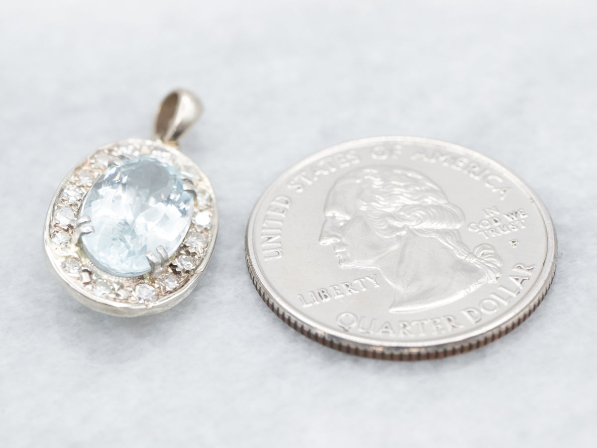 Alluring Blue Topaz and Diamond Halo Pendant
