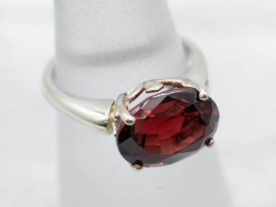 East-West Garnet Solitaire Ring