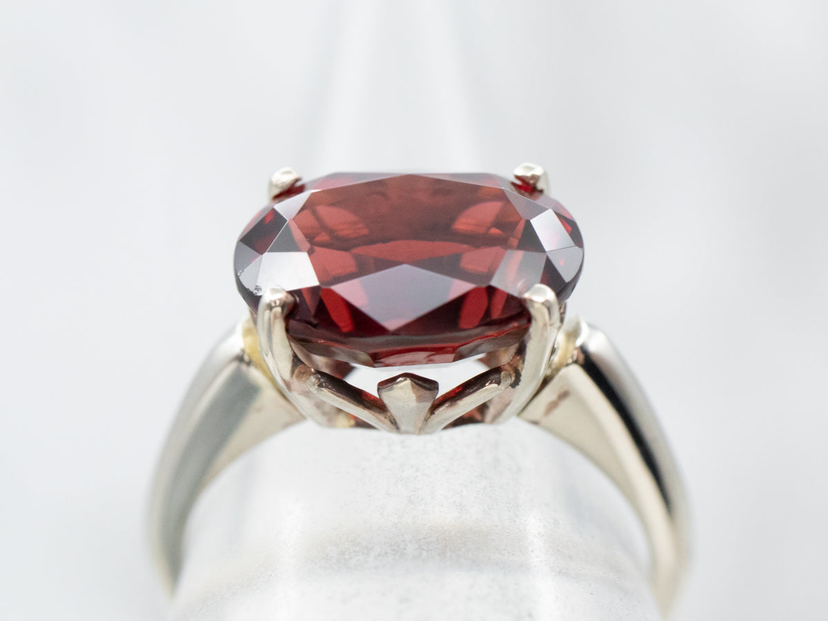 East-West Garnet Solitaire Ring
