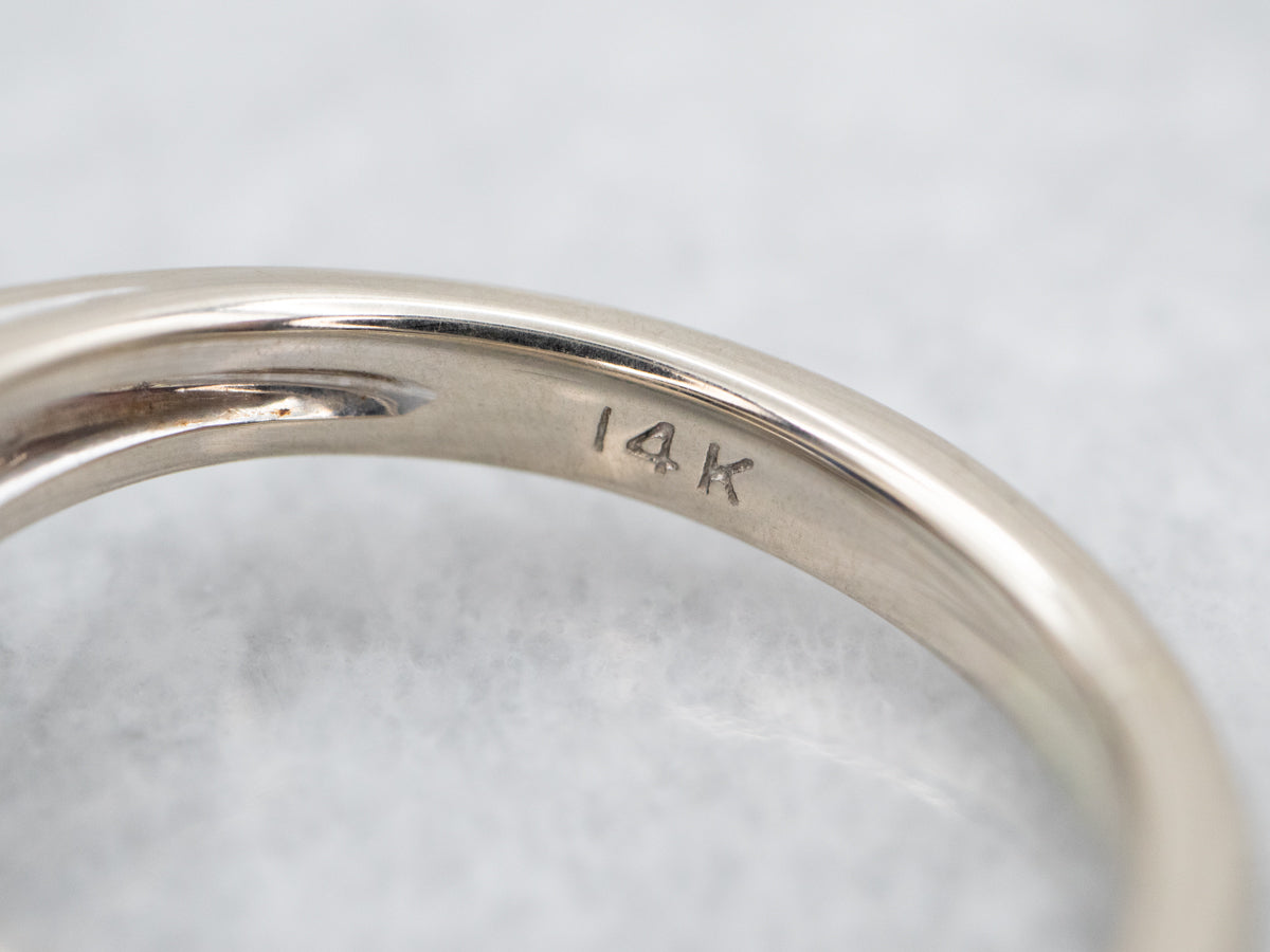 Modern Sapphire and Diamond Halo Engagement Ring