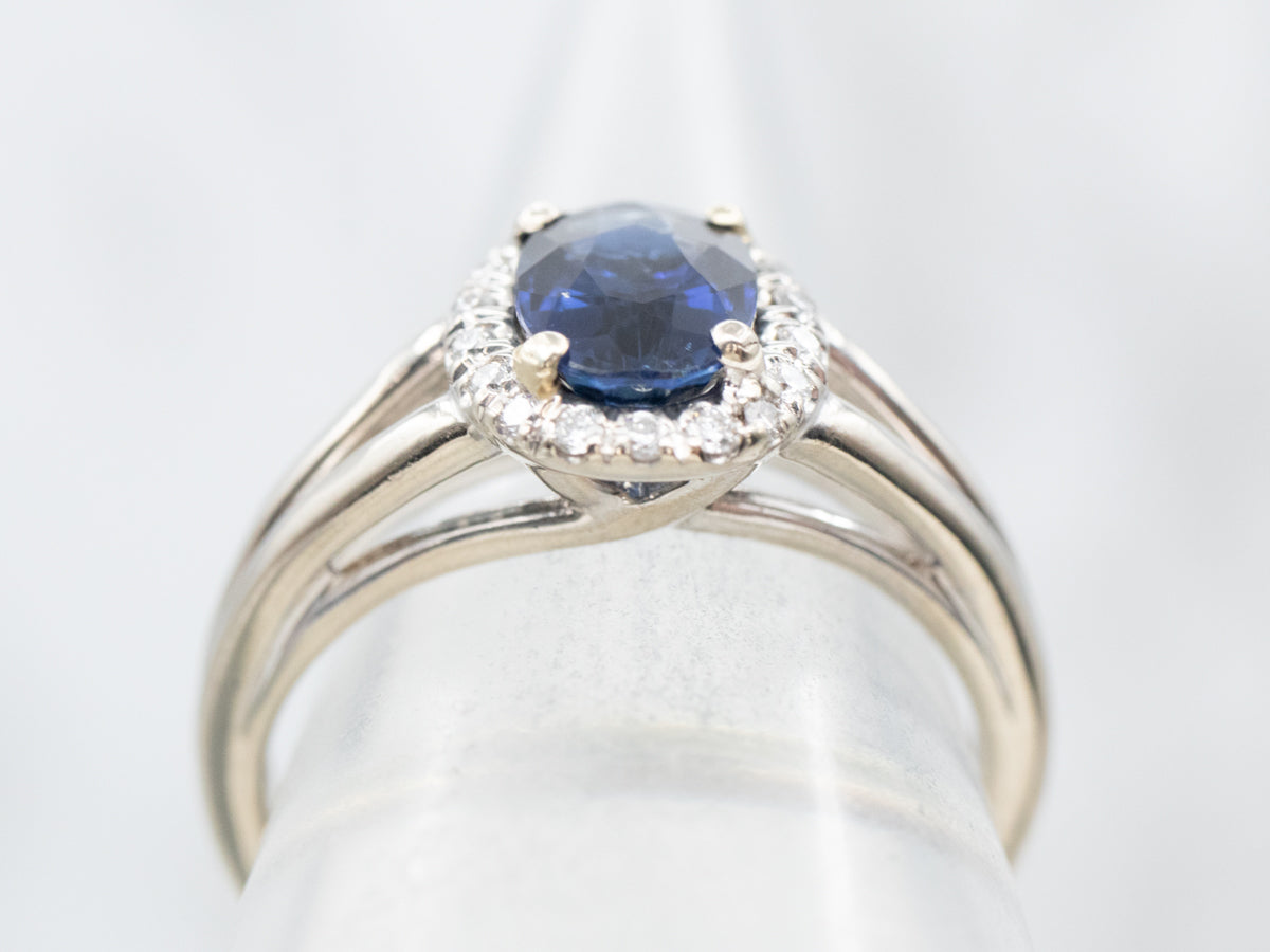 Modern Sapphire and Diamond Halo Engagement Ring