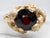 Art Nouveau Style Figure Cornucopia Pyrope Garnet Solitaire Ring