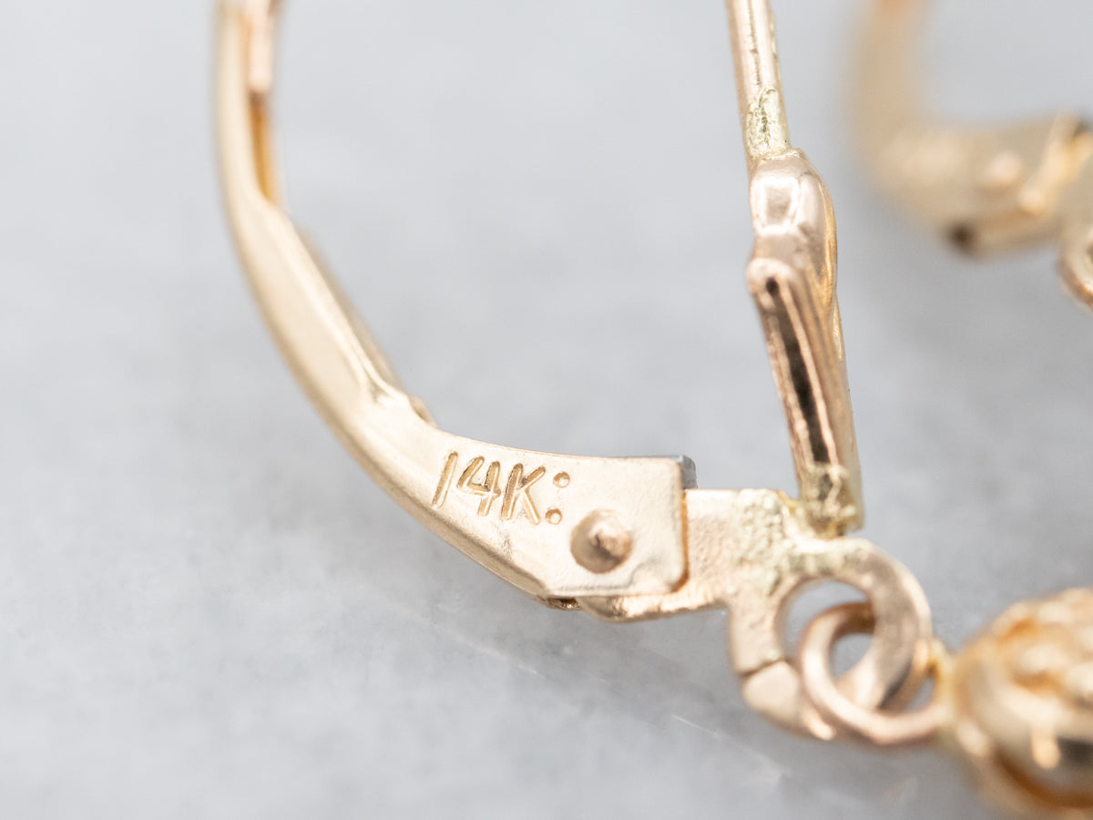 Long Scrolling Gold Amethyst Drop Earrings