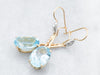 Twisting Blue Topaz and Diamond Drop Earrings