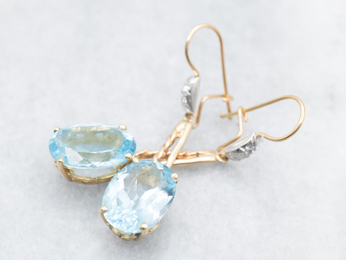 Twisting Blue Topaz and Diamond Drop Earrings