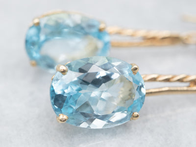 Twisting Blue Topaz and Diamond Drop Earrings