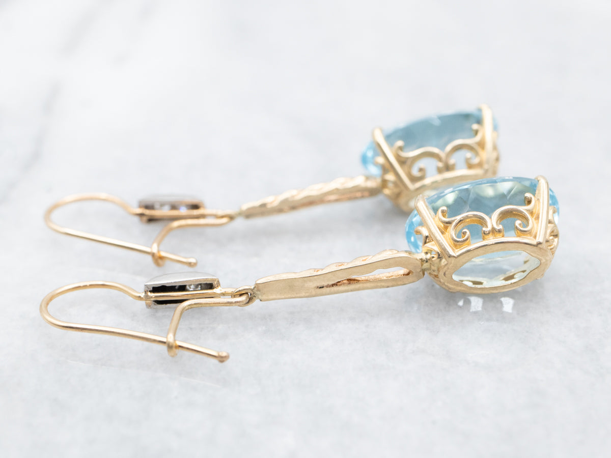 Twisting Blue Topaz and Diamond Drop Earrings