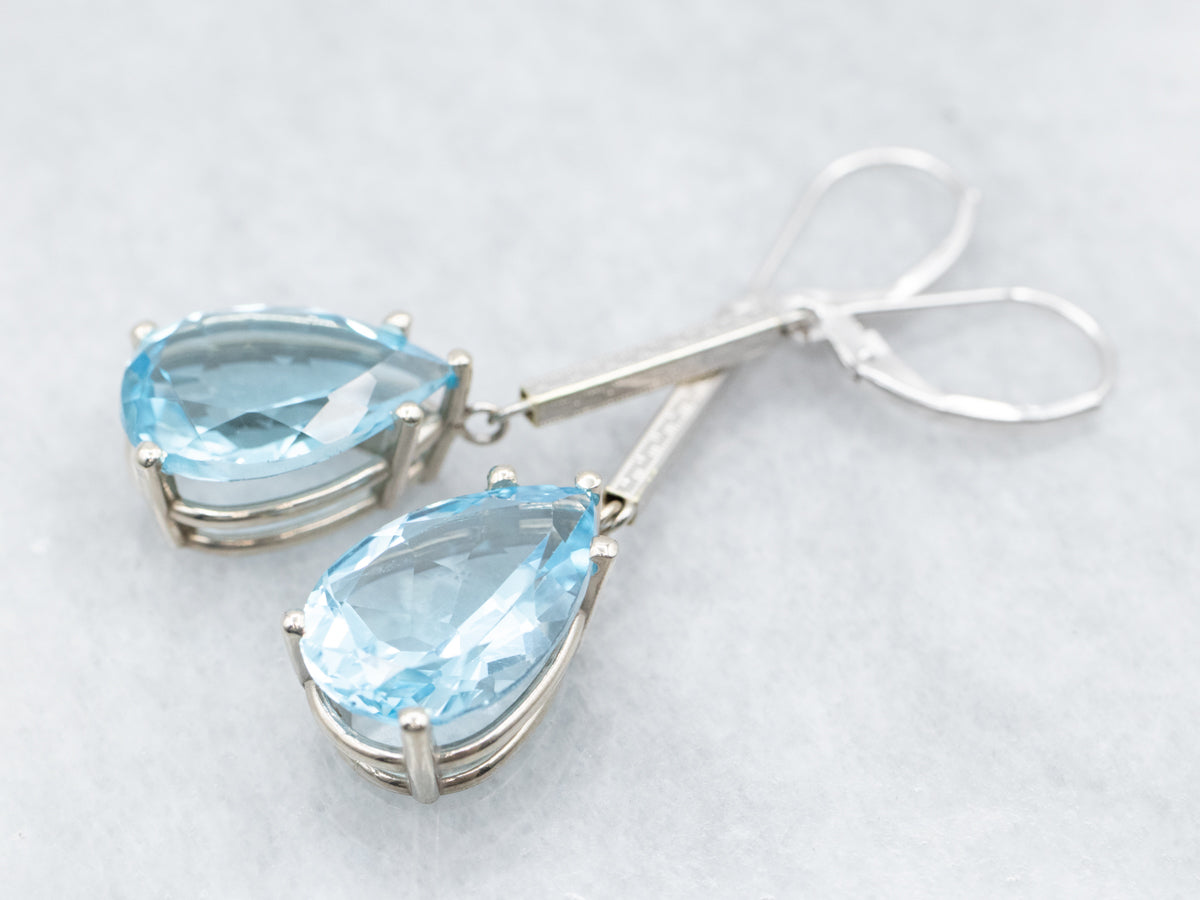 Pendientes colgantes de oro blanco con topacio azul