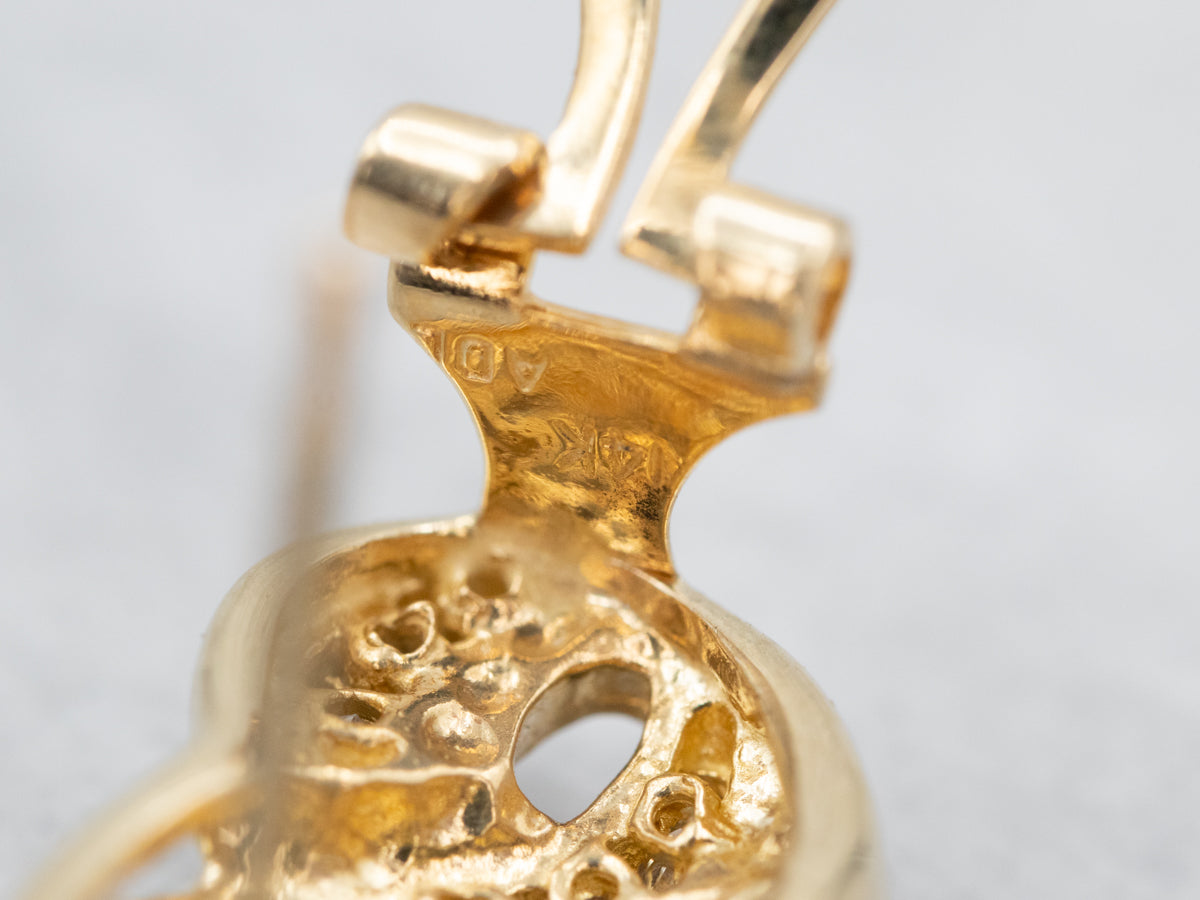 Round Brilliant and Baguette-Cut Diamond Earrings