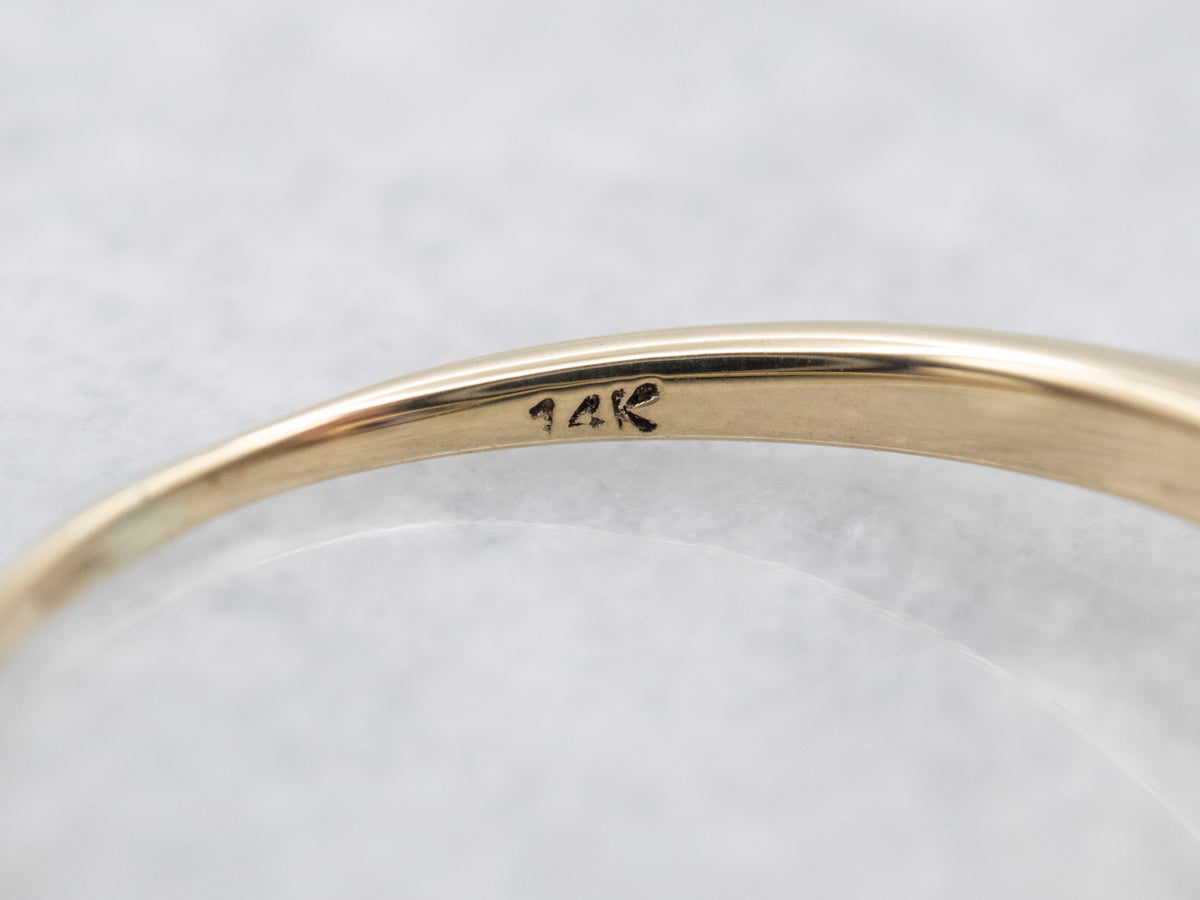 Blue Sapphire and Diamond Halo Ring