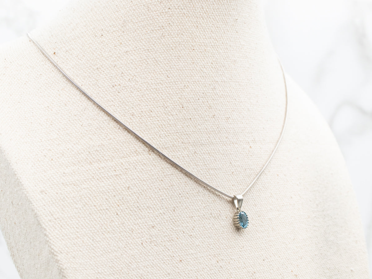Simple Prong Set Blue Topaz Solitaire Pendant