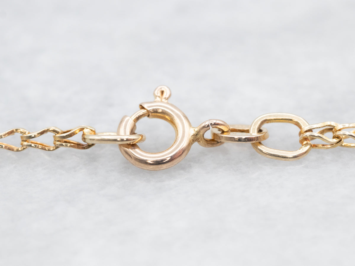 Gold Ornate Emerald and Diamond Encrusted Pendant Necklace