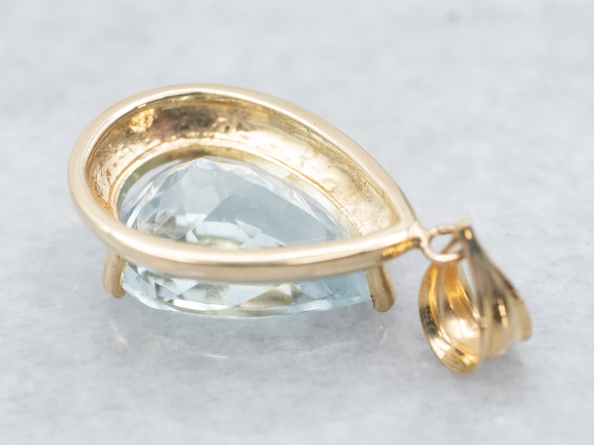 Colgante de topacio azul en forma de lágrima
