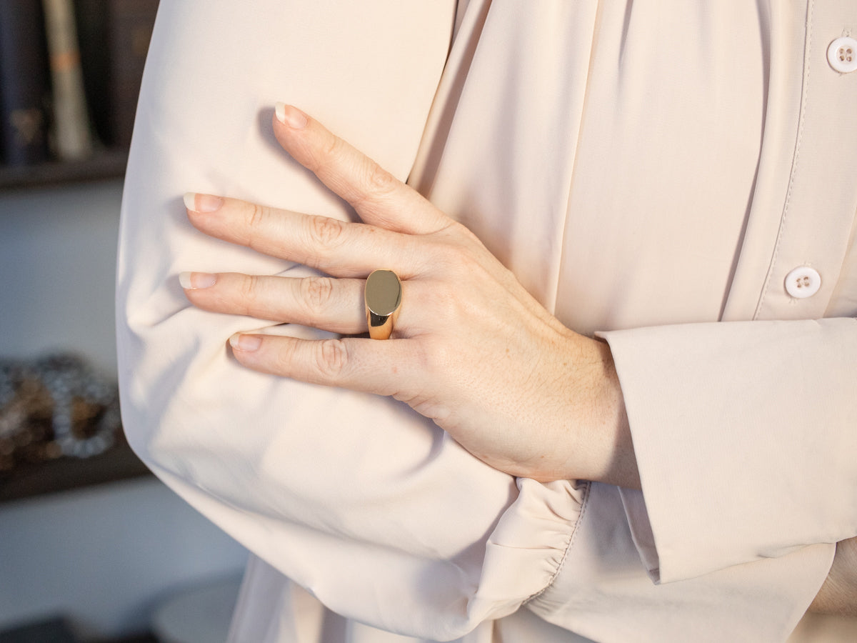 Bold East-West Oval Top Signet Ring