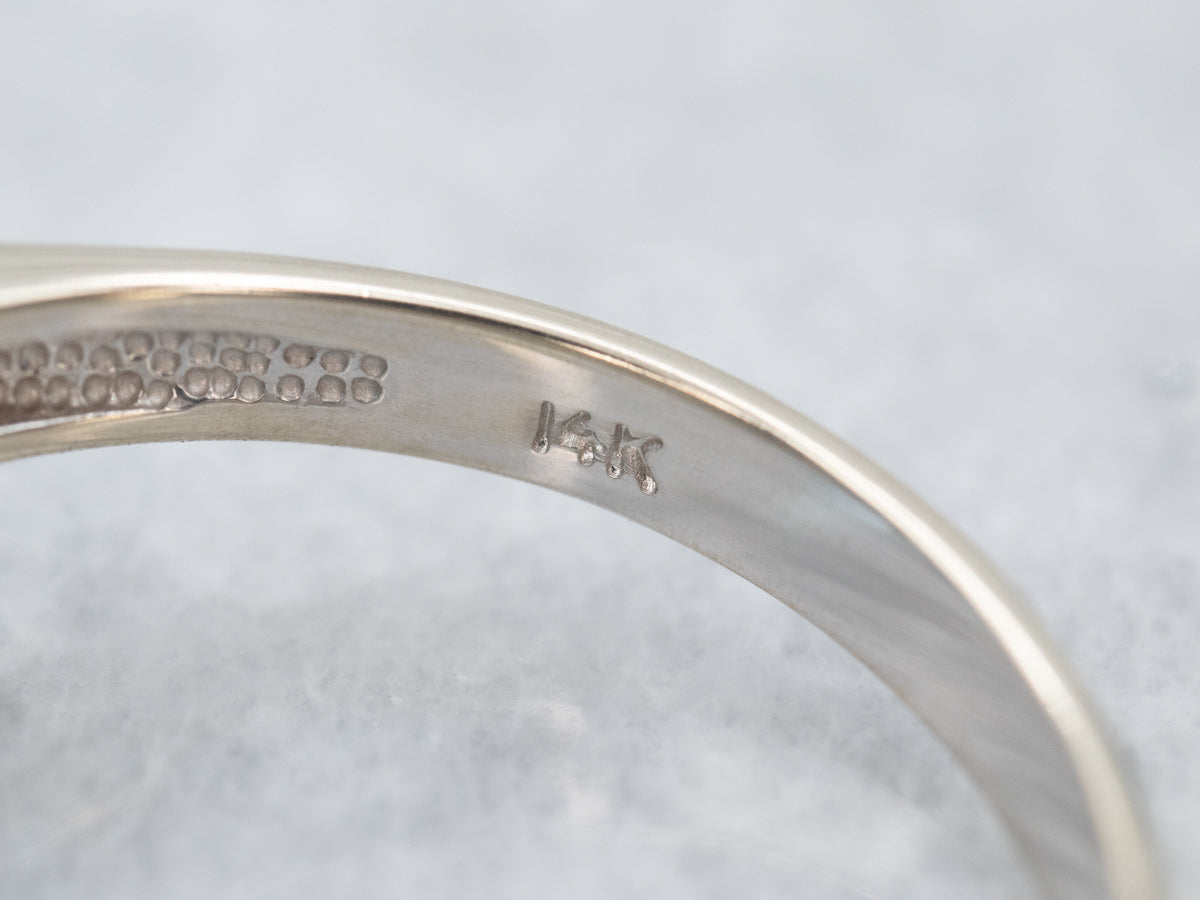 Luxurious Emerald Cut Blue Topaz and Diamond Ring