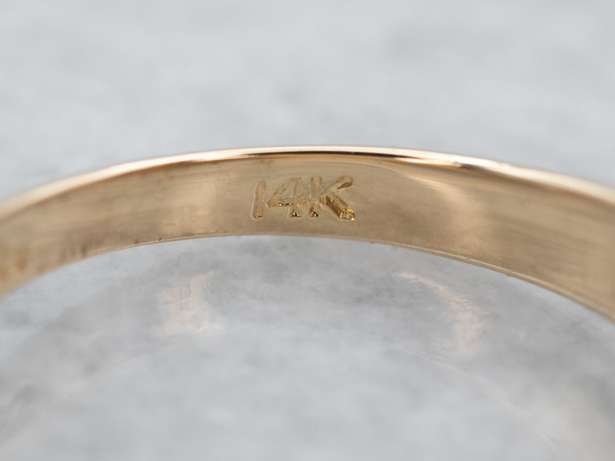 Anillo modernista de esmeralda y diamantes