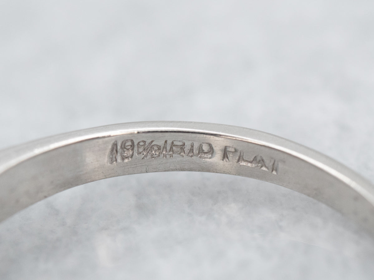 Anillo de compromiso de diamantes florales de la era retro