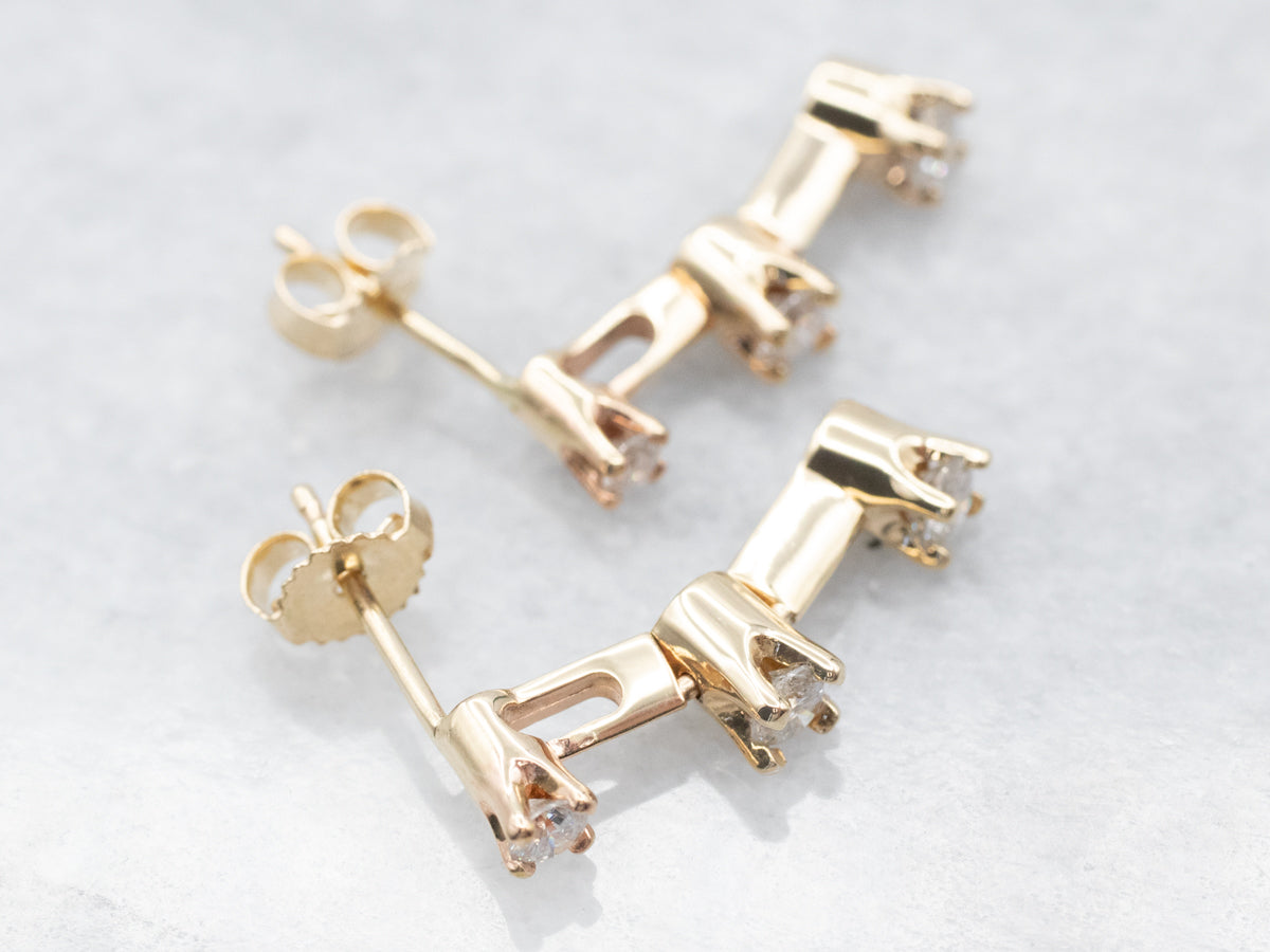 Pendientes colgantes de oro amarillo con tres diamantes