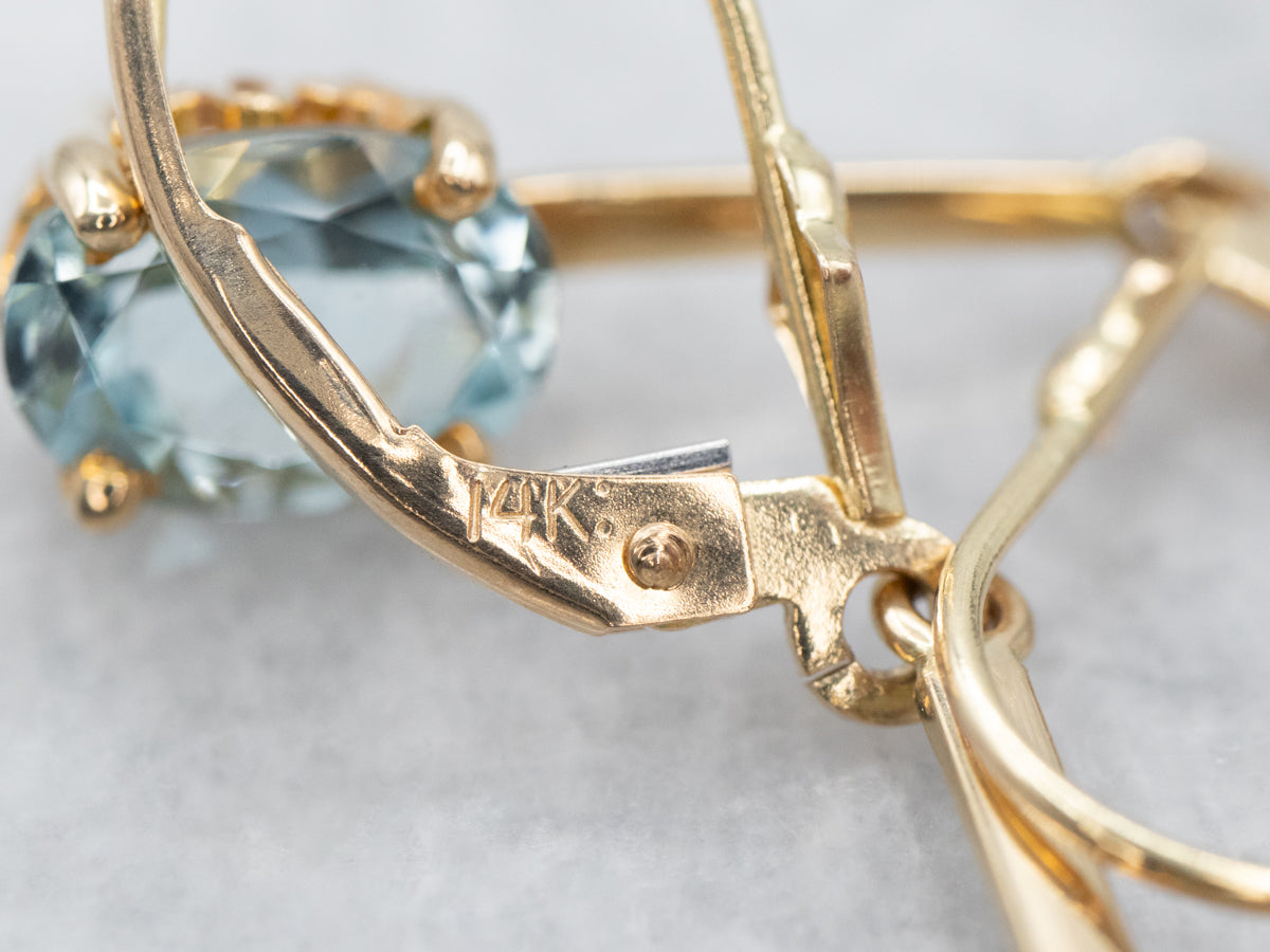 Pendientes colgantes de aguamarina en oro amarillo