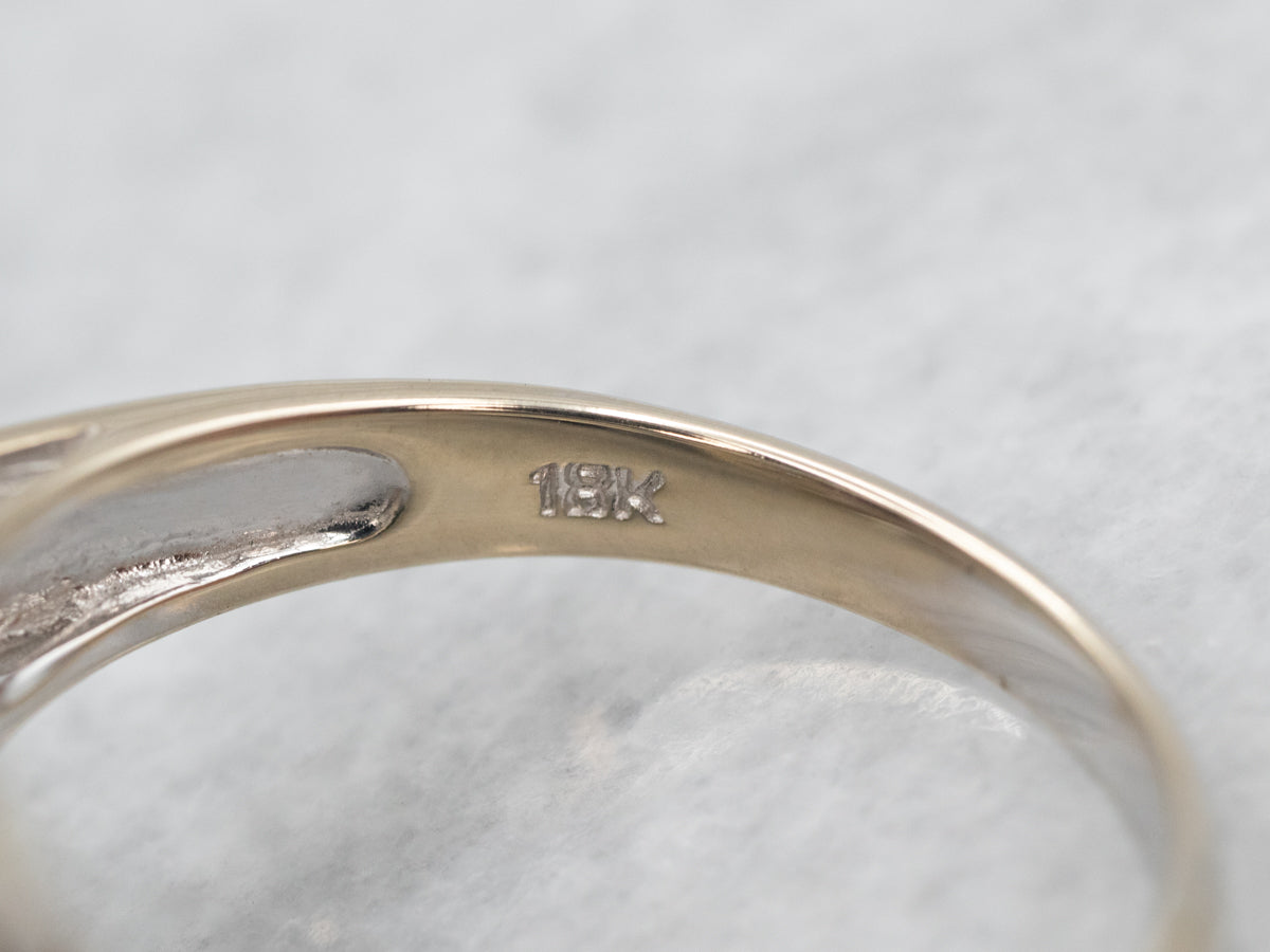 Impresionante anillo con halo de diamantes y granate piropo