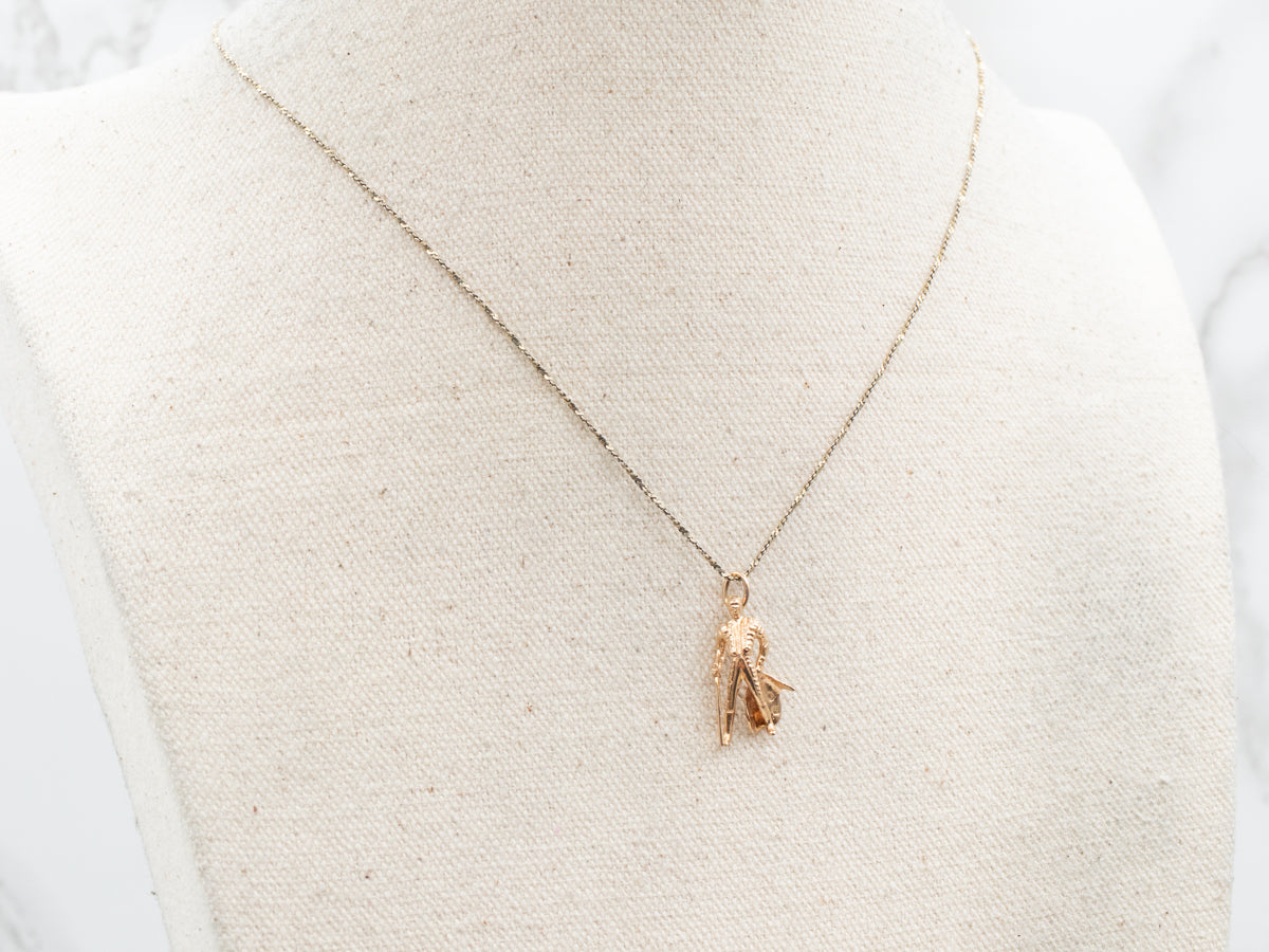 Colgante de encanto matador de oro vintage