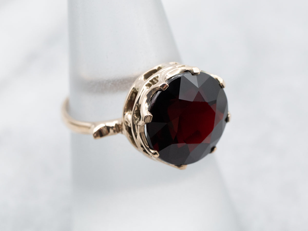 Anillo solitario vintage de granate y oro