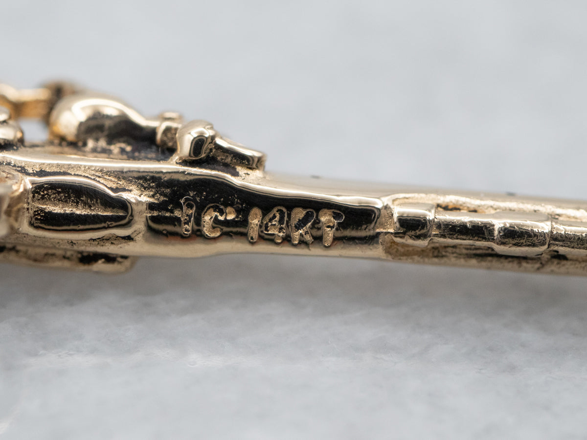 Polished Gold Revolver Pendant