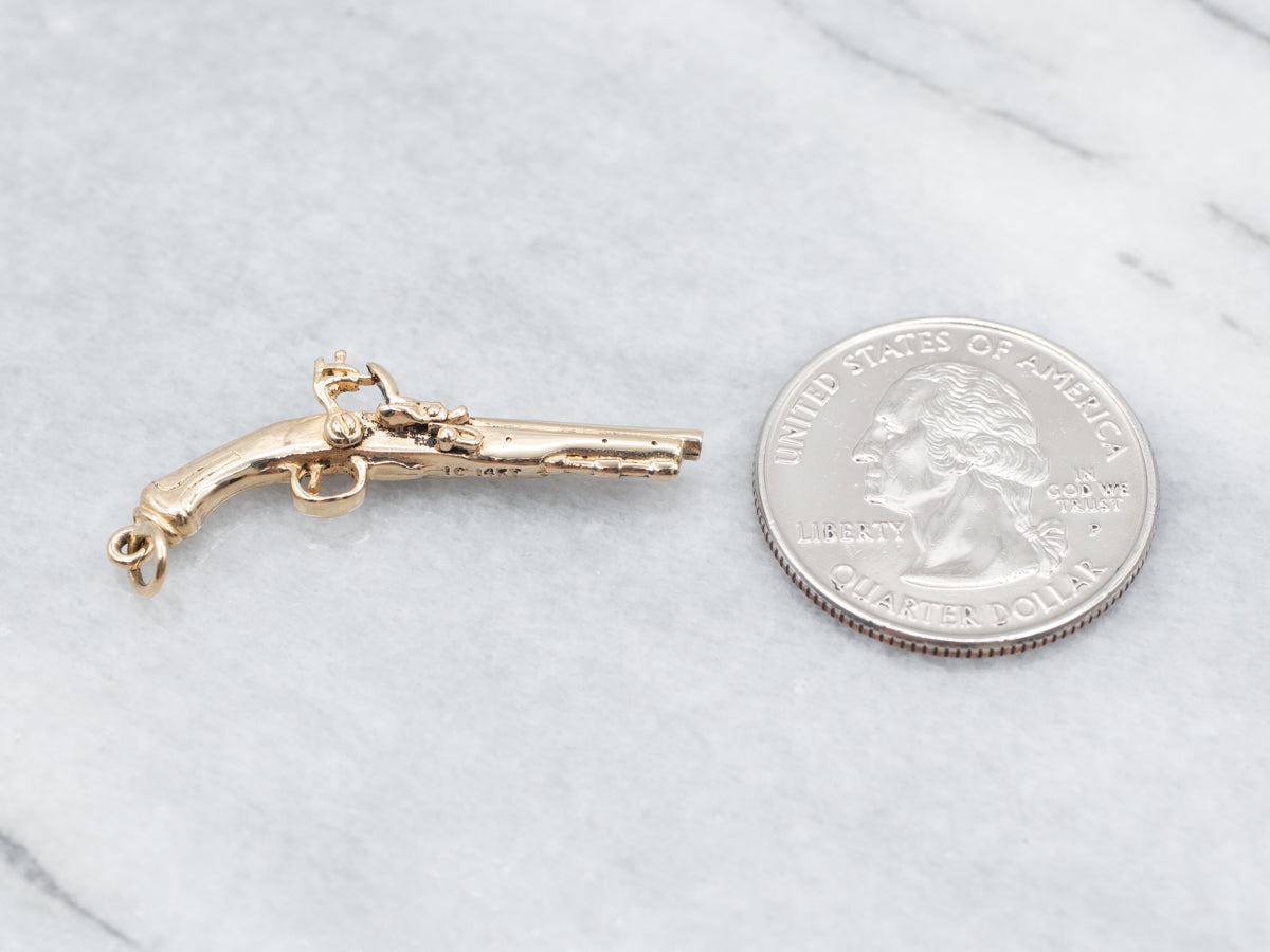 Polished Gold Revolver Pendant