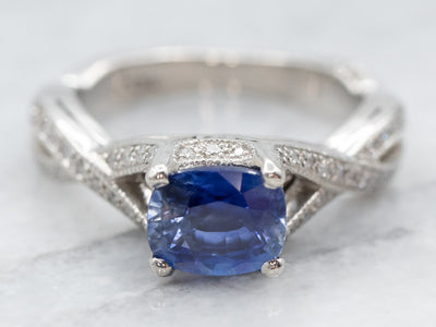 Twisting Platinum Sapphire and Diamond Ring