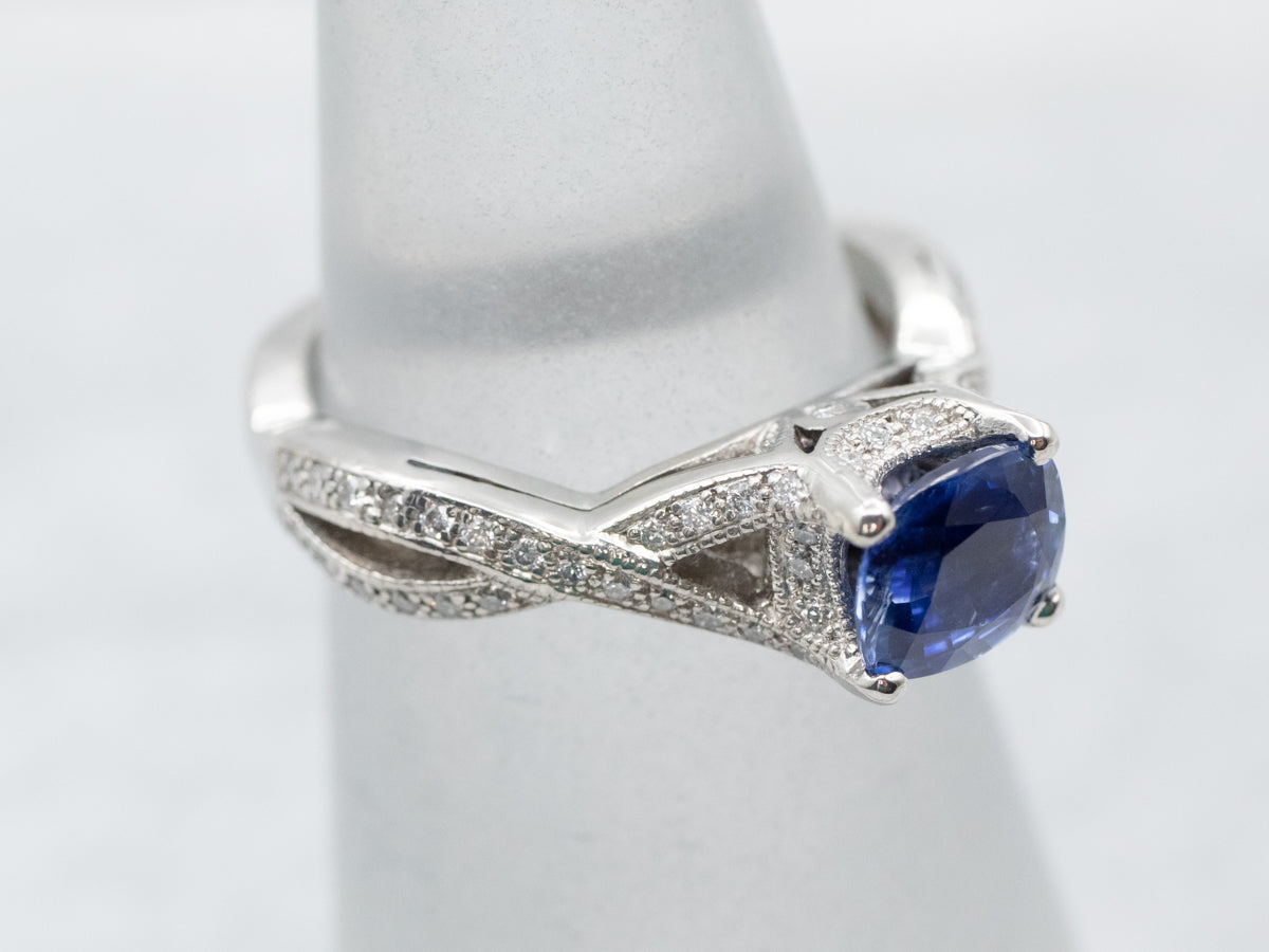 Twisting Platinum Sapphire and Diamond Ring