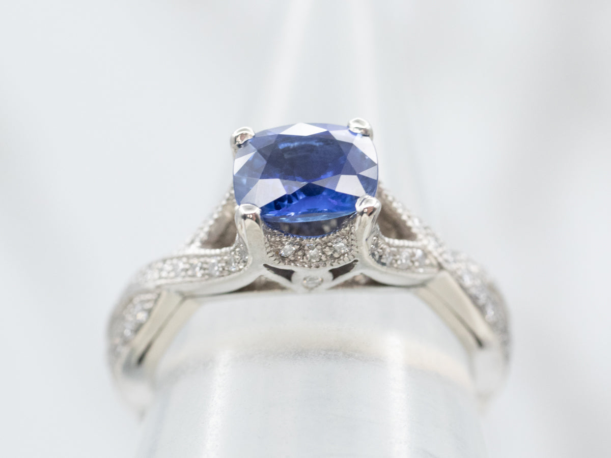 Twisting Platinum Sapphire and Diamond Ring