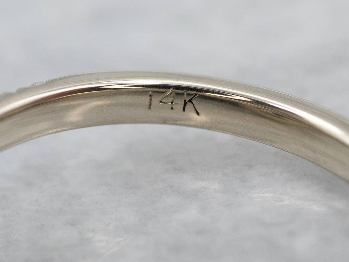 Lovely Purple Sapphire and Diamond Halo Ring