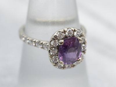 Lovely Purple Sapphire and Diamond Halo Ring