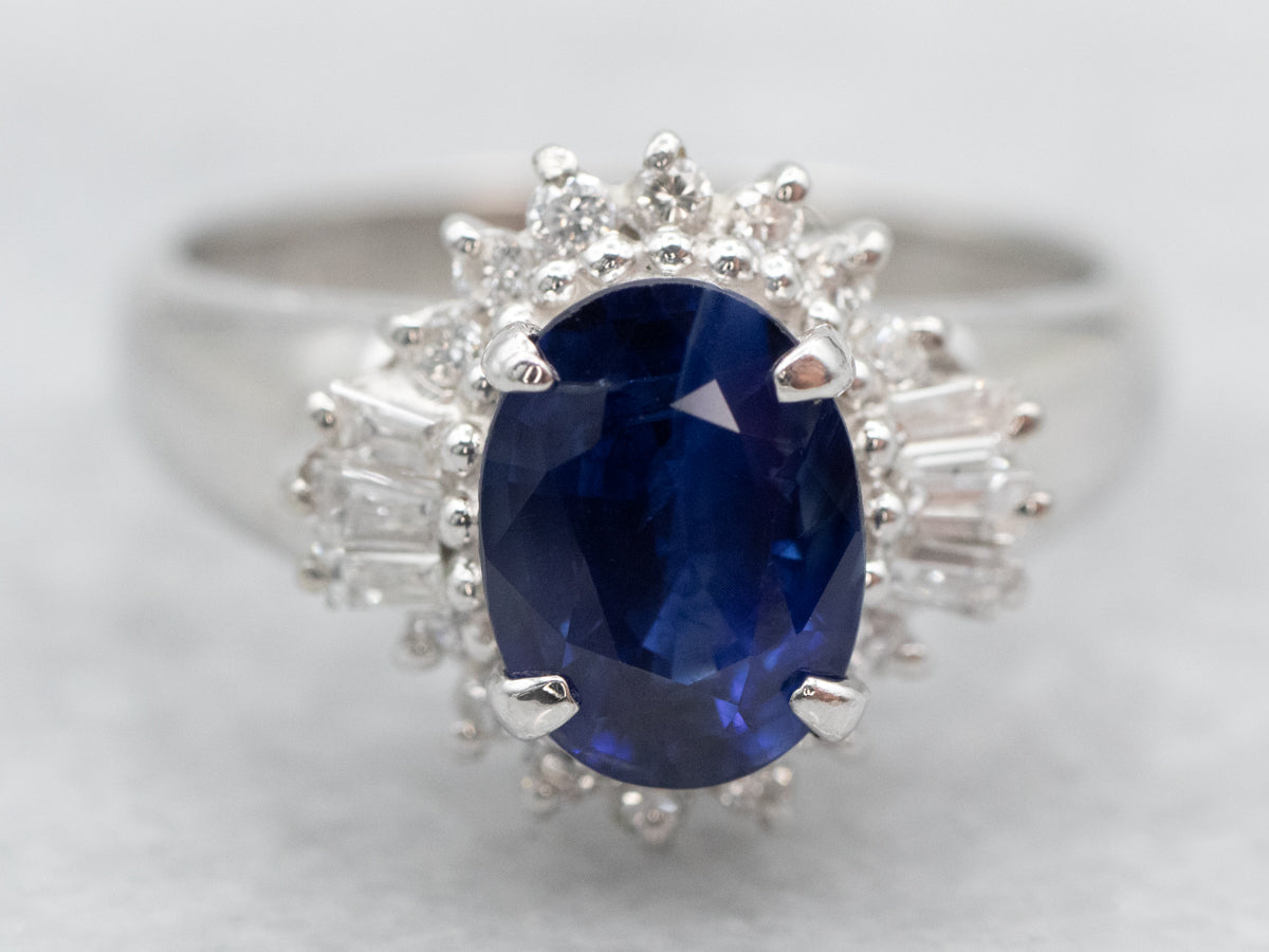 Modern Platinum Sapphire and Diamond Halo Ring