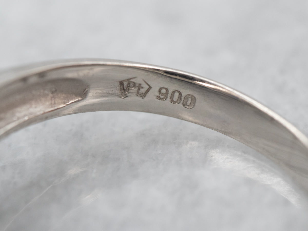 Modern Platinum Sapphire and Diamond Halo Ring