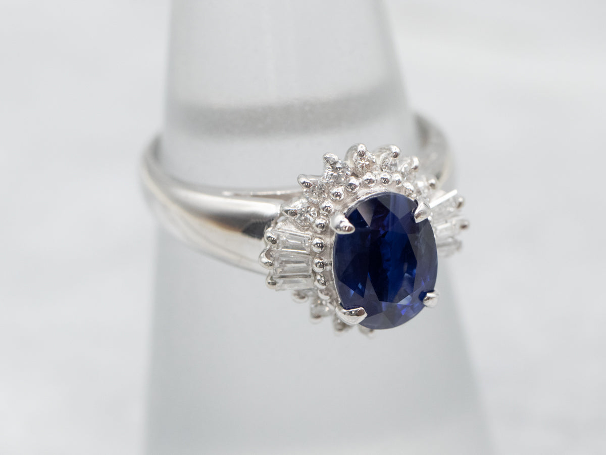 Modern Platinum Sapphire and Diamond Halo Ring