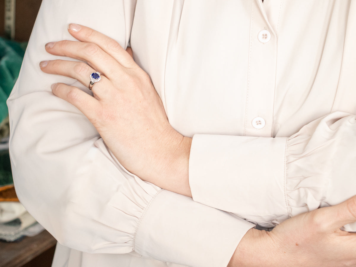 Modern Platinum Sapphire and Diamond Halo Ring