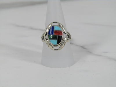 Silver Oval Ring With A Variety Of Different Stones