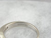White Gold Curved Channel Set Diamond Wedding Band