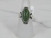 Silver Bezel Set Nephrite Jade Ring With Swirling Accents