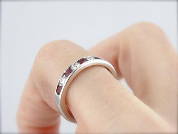 Classic Platinum Diamond and Ruby Channel Set Wedding Band