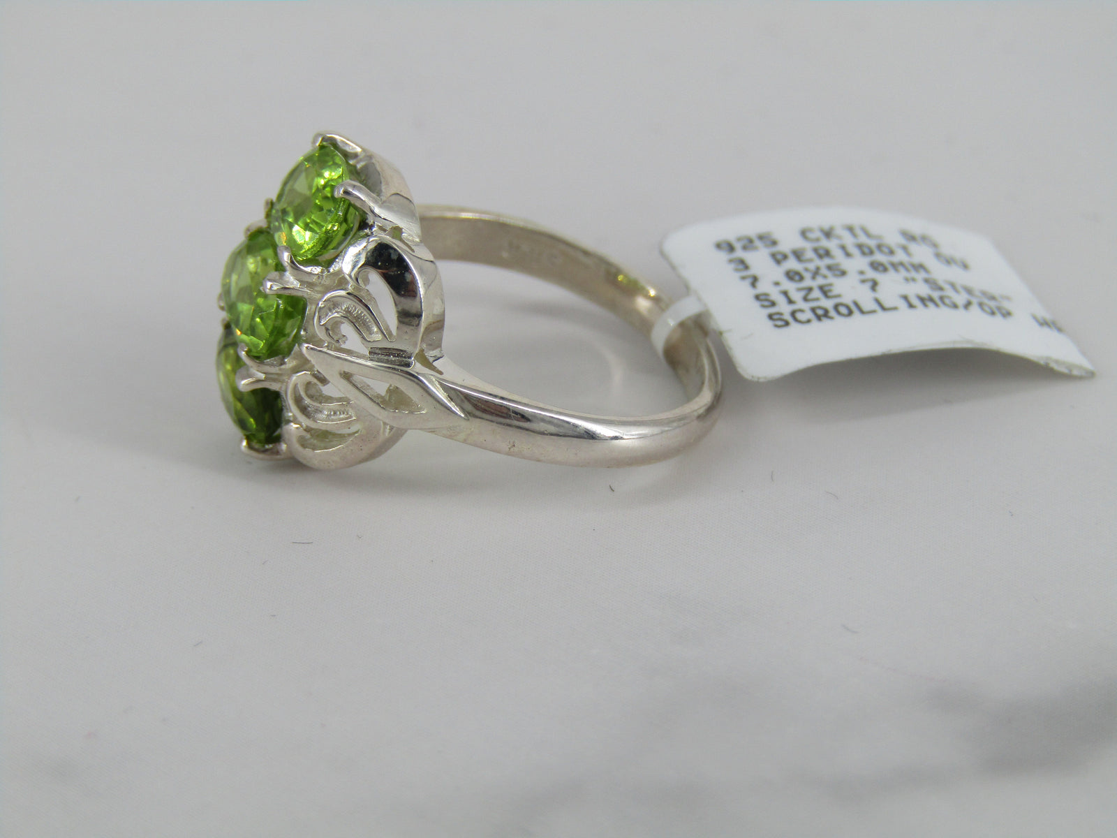 Scrolling Three Stone Silver Peridot Ring