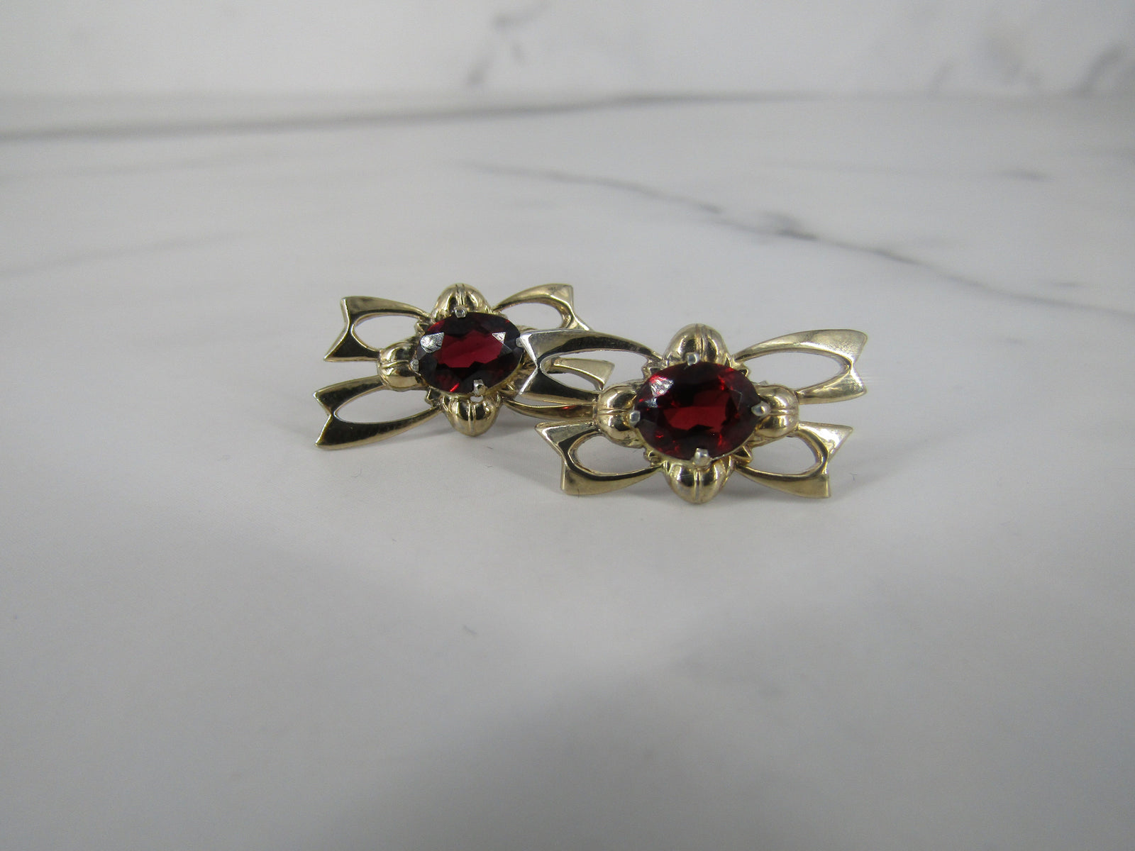 Gold Plated Openwork Studs with Garnet Center Stone