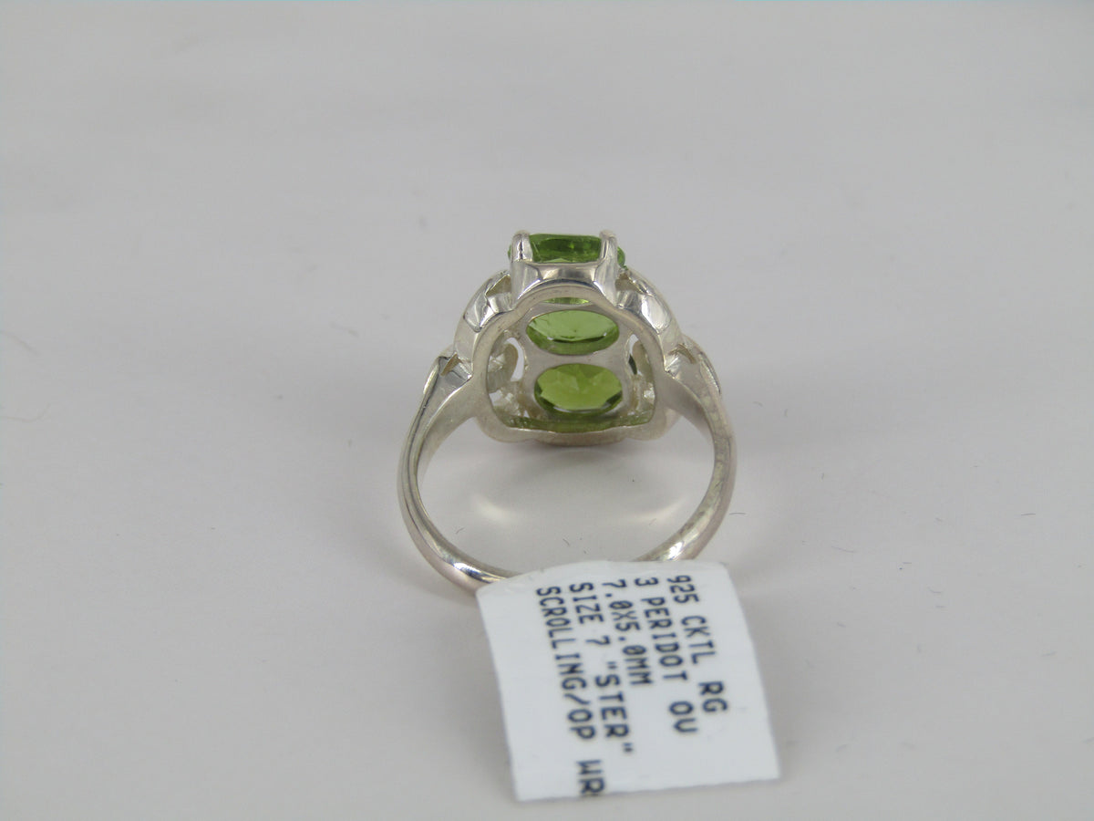 Scrolling Three Stone Silver Peridot Ring