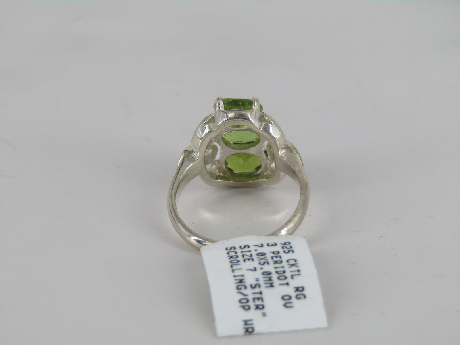 Scrolling Three Stone Silver Peridot Ring